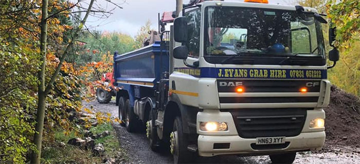 J Evans Grab Hire truck in forest